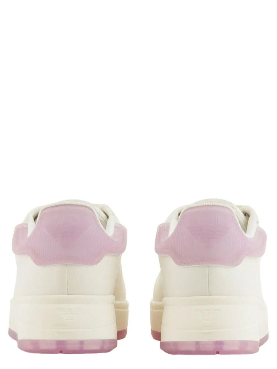 Sneakers in pelle con retro in gomma a contrasto