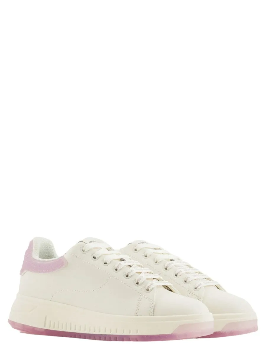 Sneakers in pelle con retro in gomma a contrasto